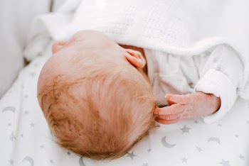 Photo of Baby Lying Down