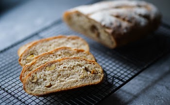 Photo of Baked Bread on Black Metal Tray