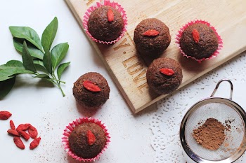 Photo of Baked Muffins Beside Green Leaves