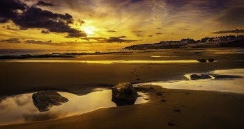 Photo of Beach Sand During Golden Hour