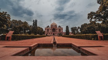 Photo of Beige and Brown Building Beside Garden