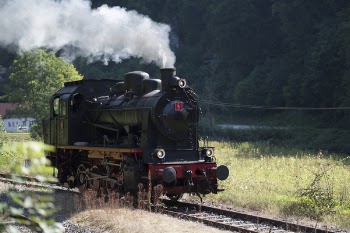 Photo of Black and Brown Train