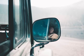 photo of black vehicle winged mirror