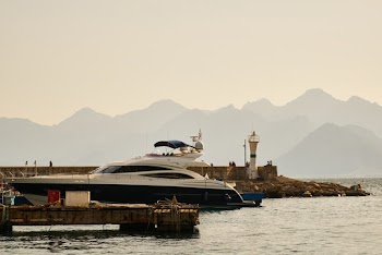 Photo of Boat Docked on Pier