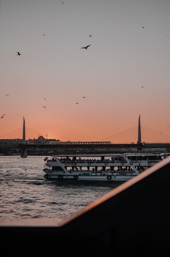 Photo of Boat on River During Golden Hour