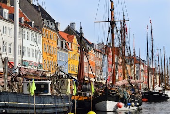 Photo Of Boats Beside Houses