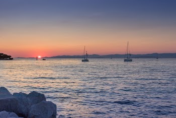 Photo Of Boats During Dawn 