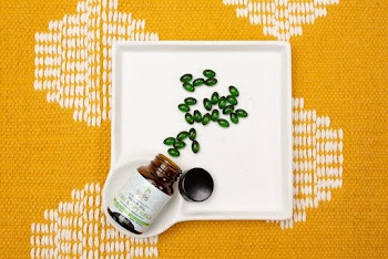 Photo Of Bottle On Plate