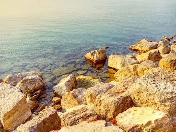Photo of Boulders Near Body of Water