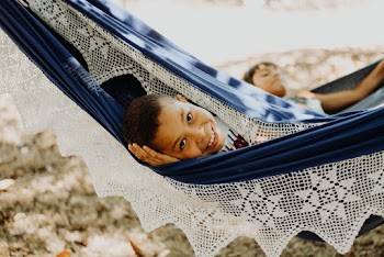 Photo Of Boy Laying On Hammock 