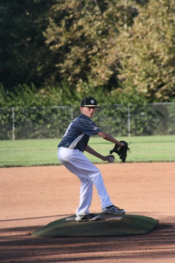 Photo of Boy Pitching Ball