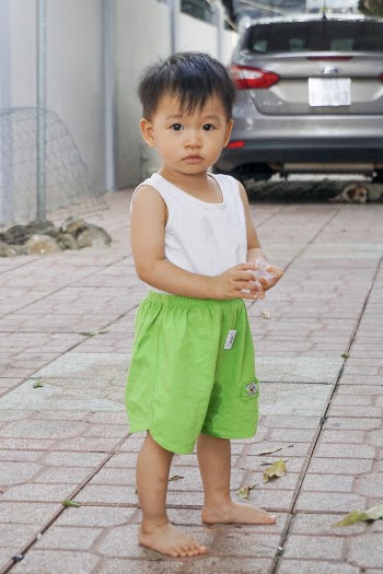 Photo of Boy Standing Outside