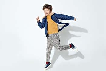 Photo of Boy Wearing Denim Jacket