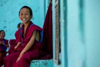 Photo of Boy Wearing Red Robe