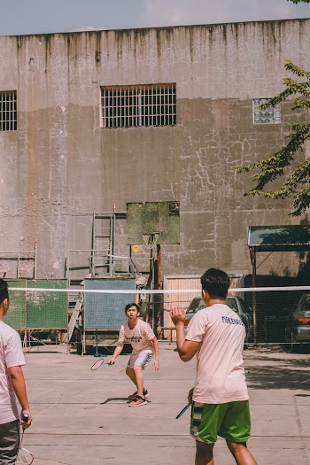 Photo of Boys Playing Badminton