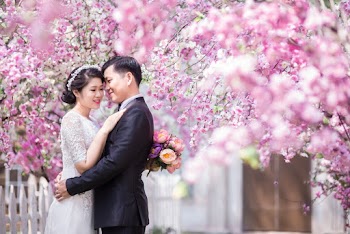 Photo of Bride and Groom Embracing