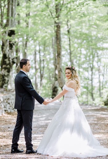Photo Of Bride And Groom Holding Hands