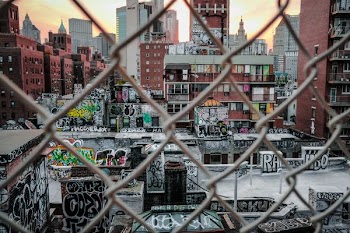 photo of brown concrete city buildings at daytime