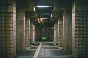 Photo of Brown Concrete Hallway