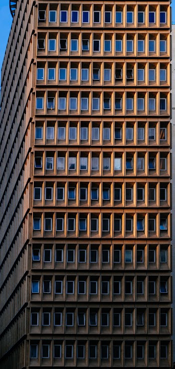 Photo of Brown High-rise Building