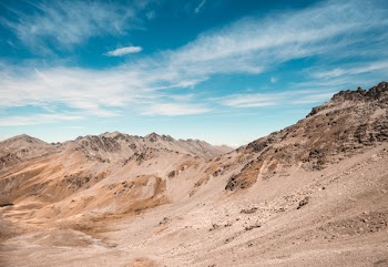 Photo of Brown Hills Under Blue Sky