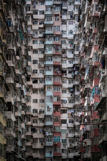 Photo of Brown, Red, and White Buildings