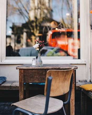Photo of Brown Wooden Table and Chair