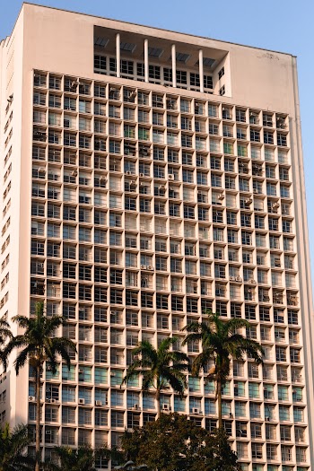 Photo of Building Near Palm Trees