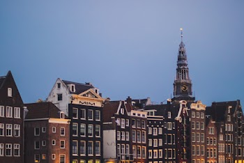 Photo Of Buildings During Dawn