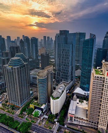 Photo Of Buildings During Dawn 