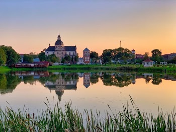 Photo Of Buildings Near Body Of Water