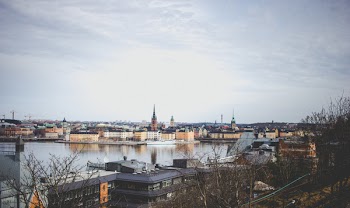 Photo Of Buildings Near Body Of Water