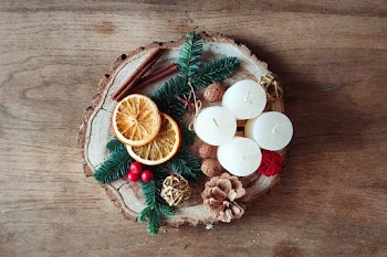 Photo Of Candles On Top Of Wooden Log