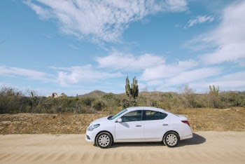 Photo of Car Parked Under Blue Sky