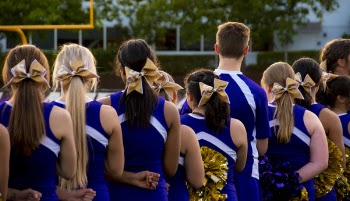 Photo of Cheerleaders in Blue-and-white Uniform