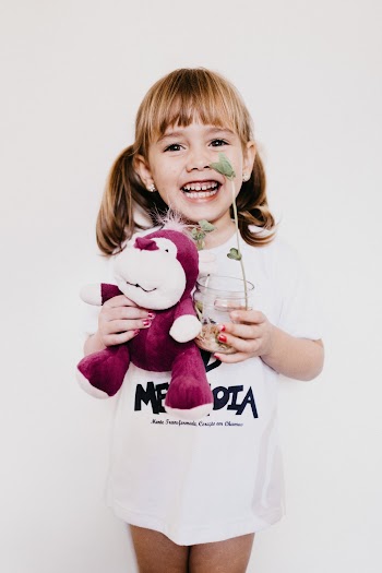 Photo Of Child Holding Stuffed Toy
