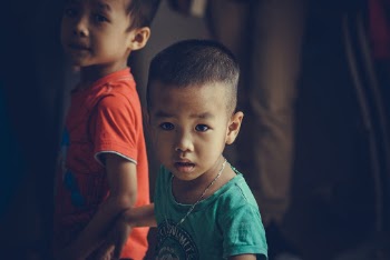 Photo Of Child Wearing Turquoise Shirt