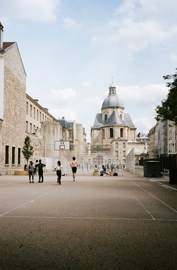 Photo of Children Playing Basketball