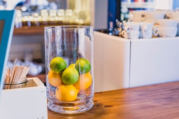 Photo of Citrus Fruits Inside a Clear Glass