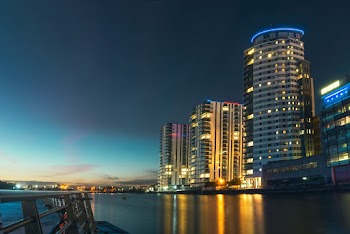 Photo Of City Building During Dawn