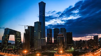 Photo Of City During Dawn