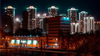 Photo of City During Evening