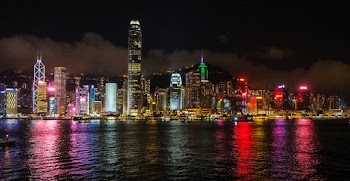 Photo Of City During Evening