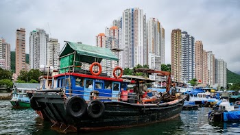 Photo Of City Near Water Port