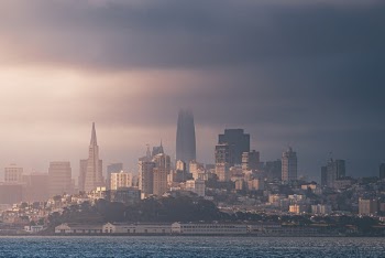 Photo of City Skyline Under Gray Sky
