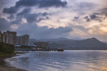 Photo of City Under Cloudy Sky