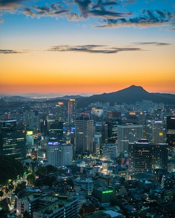 Photo of Cityscape During Golden Hour