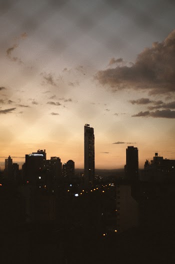 Photo of Cityscape Under Evening Sky