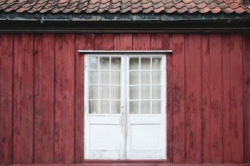 photo of closed white wooden window