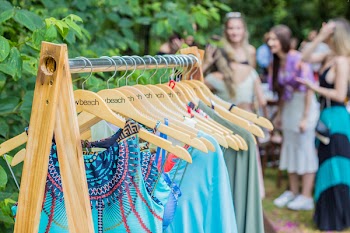 Photo Of Clothes Hanged On Clothes Rack